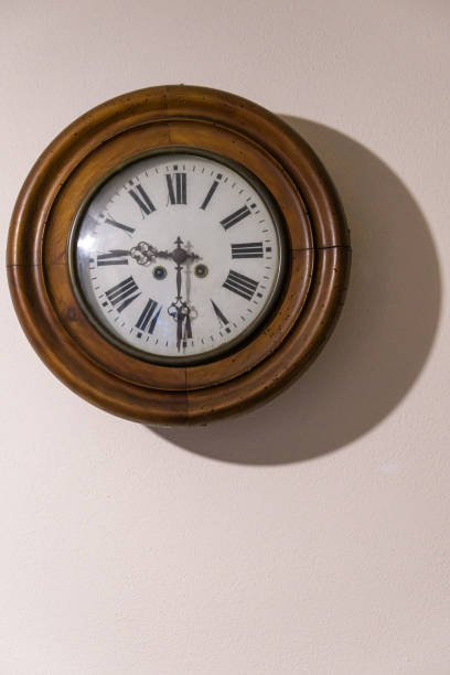 istock Antique wooden wall clock 1486866387