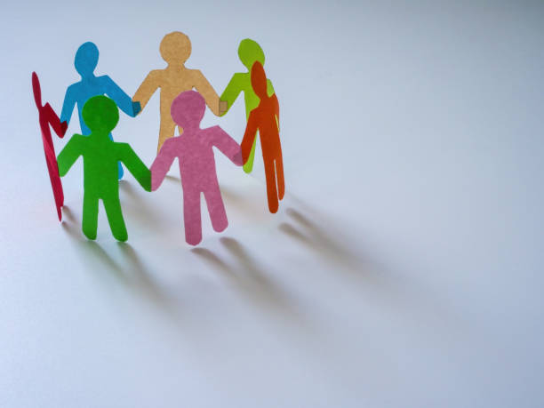 istock Cultural integrity concept. Paper multi-colored figures together. 1486870890