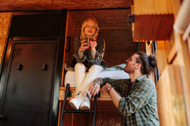 istock Couple relaxing at weekend cabin. 1486870996