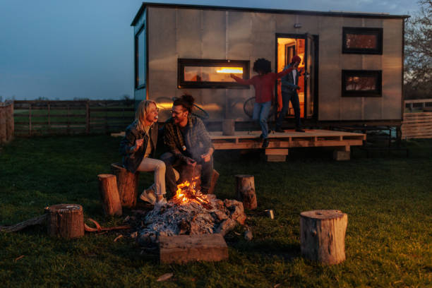 istock Friends enjoying campfire on vacation. 1486871705