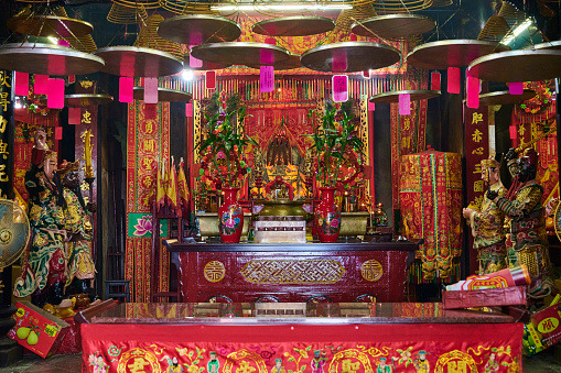 Hong Kong - April 02, 2023: interior of Kwan Tai Temple, the oldest temple in Tai O. It is dedicated to Kwan Tai who was a military general renowned for his loyalty. It is believed that he will protect devotees from evil spirits.