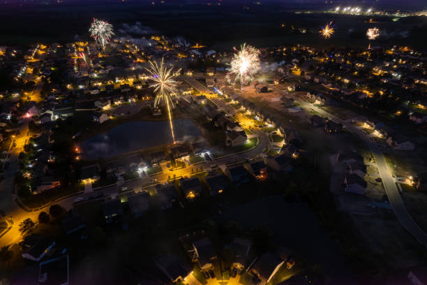 istock Fireworks over a suburbs in Midwest America 1486875482