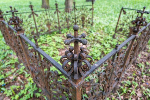 Spooky dark cemetery on the stormy winter day.