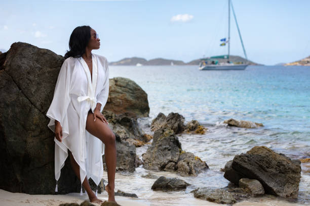 istock Woman with beach cover up 1486878166