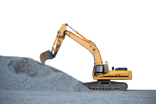 Digger with big heap of gravel, isolated on white