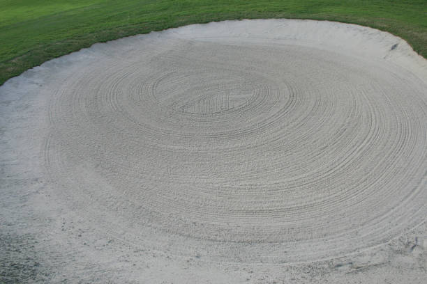 istock Putting Green and White Sand Trap Background Textures 1486886102