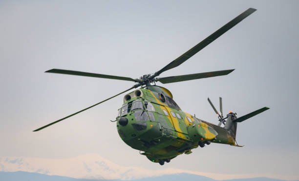 istock Military helicopter on mission. 1486887965