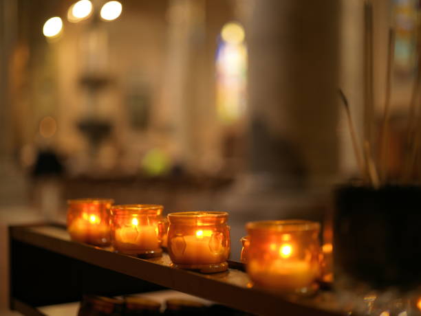 istock votive lights lit in church 1486888979