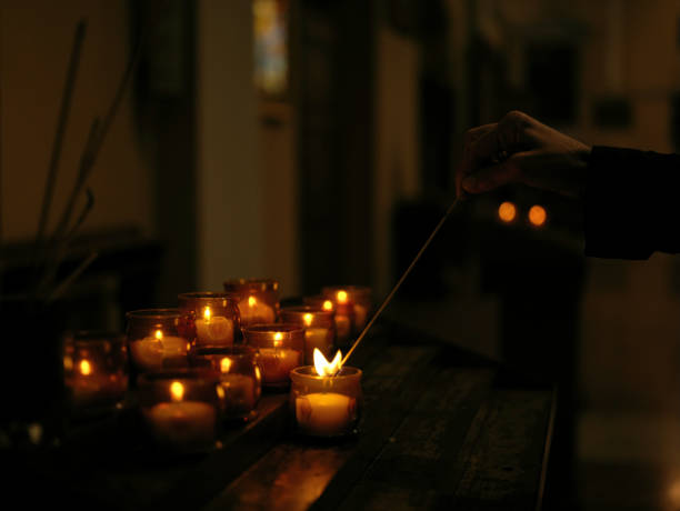 istock votive lights lit in church 1486889033