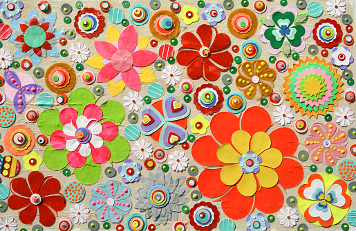 Flowers, abstract composition made of paper layers, quilling with die cut and scissors, abstract background painting.