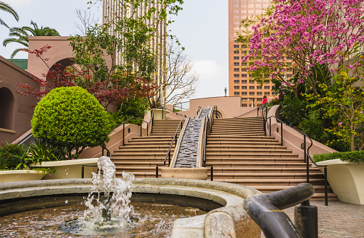 Los Angeles, California, USA - April 25, 2023. Library Tower plaza. Stream,  fountain, and steps on 5th Street in the Downtown city of los Angeles