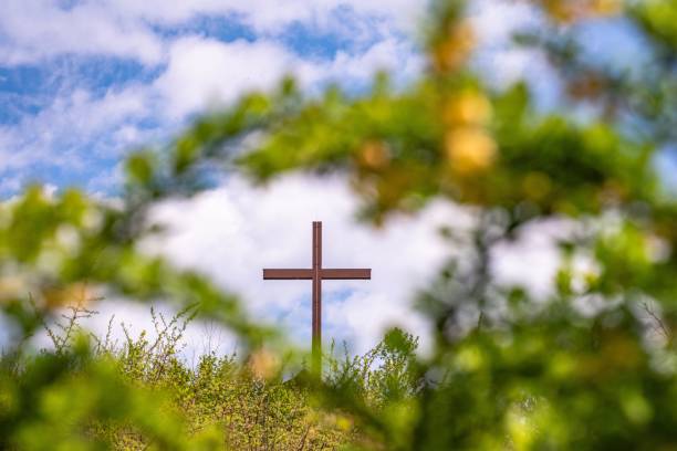istock Landscape with a cross in a mountain village 1486891694