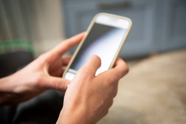 istock Smartphone in female hand 1486894222