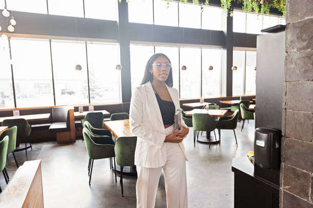 istock Biracial Woman Manager Working at Restaurant 1486894926