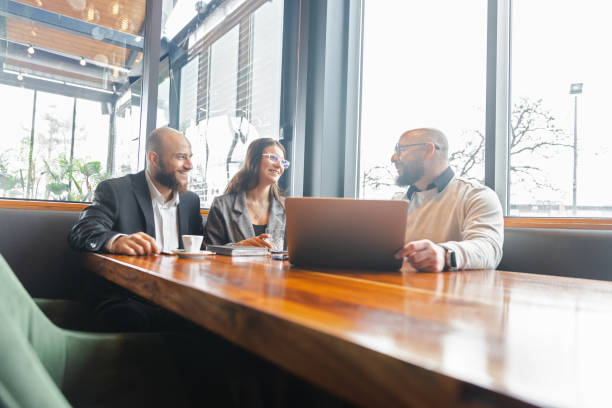 istock Young Couple Consulting a Financial Advisor 1486894946
