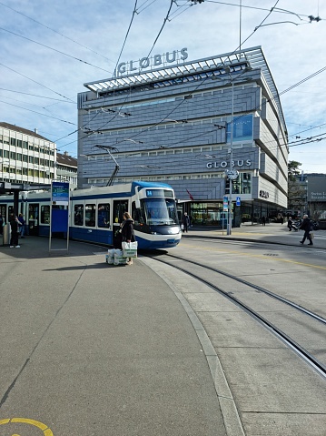 Globus is a Swiss department store company, with 13 department stores in Switzerland (Founded 1907). The Globus shopping building in Zurich City captured during spring season.