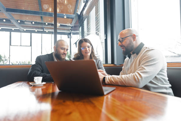 istock Young Couple Consulting a Financial Advisor 1486894974