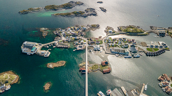Aerial footage of Svolvaer in Lofoten, Norway, during a sunny spring day with few clouds