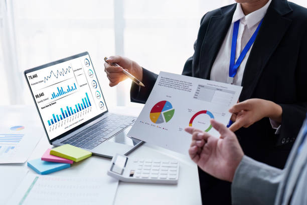 istock Group of Business people using AI to help and analysis and research finance data. Artificial Intelligence, Futuristic technology transformation concept 1486896944