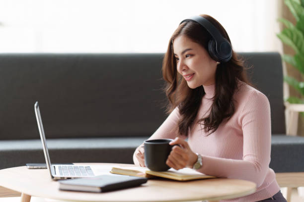 istock Confident woman executive using laptop computer, having video conference call virtual meeting, advisor finance, research, fund 1486900694