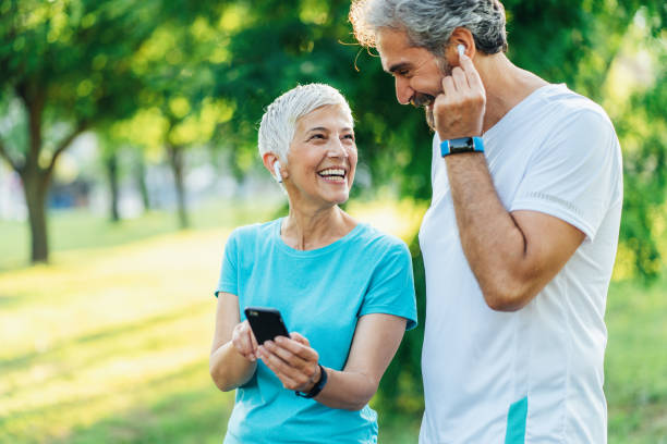 istock Senior friends jogging together 1486901628