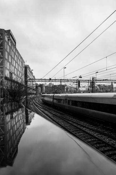 istock a train on railway in city during a rainy day 1486905621