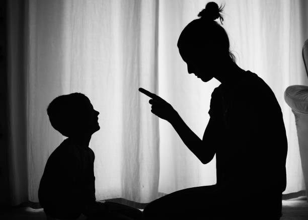 istock Mother disciplining correcting her child for misbehaving 1486907324