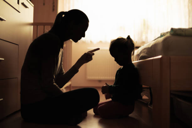 istock parent teaching correcting dissiplining child 1486907465