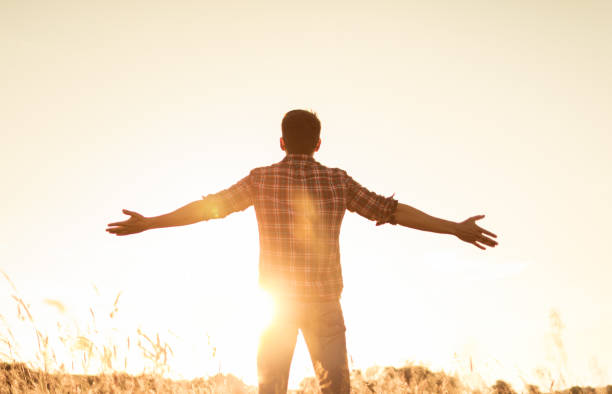 istock Man feeling inspired happy free nature 1486908812