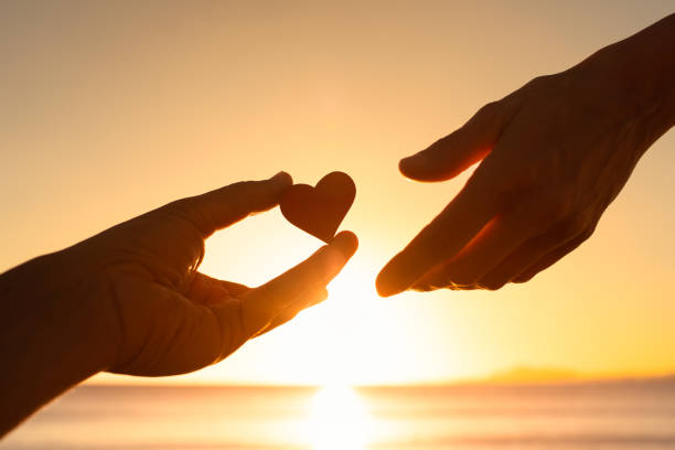 istock Hand giving heart love help support kindness friendship 1486910026