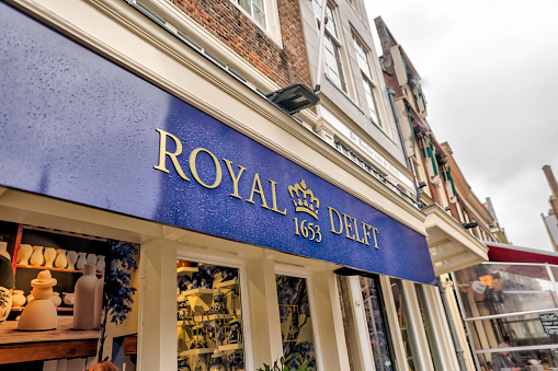 Delft, Netherlands - March 31, 2023: Signage for the Royal Delft Store in Delft in the Netherlands