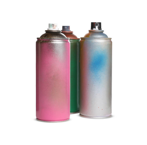 istock Used cans of spray paints on white background 1486926632