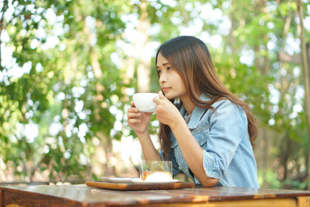 istock Woman drinking coffee in the morning before work 1486934826