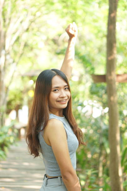 istock happy smiling woman in coffee cafe 1486936411