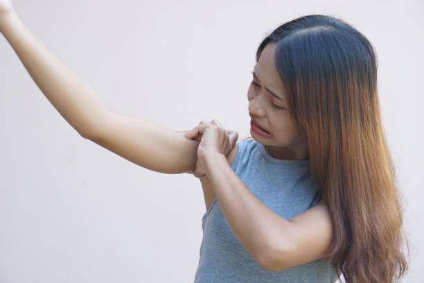 istock Asian woman having shoulder pain 1486938286