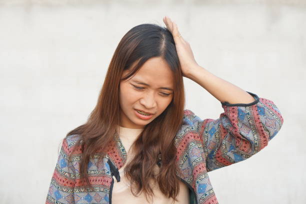 istock Asian woman has an embarrassment headache from work 1486940655