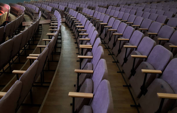 istock Row of empty chairs in the hall 1486941290