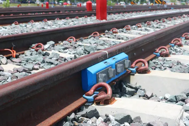 Fishplate steel rail with clip lock connection on concrete sleepers.