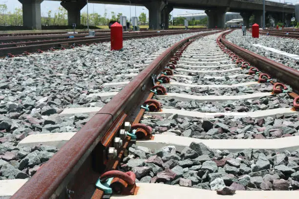 Fishplate bolt connection steel railway on concrete sleepers.