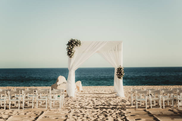 istock Wedding ceremony arch on the beach 1486951581
