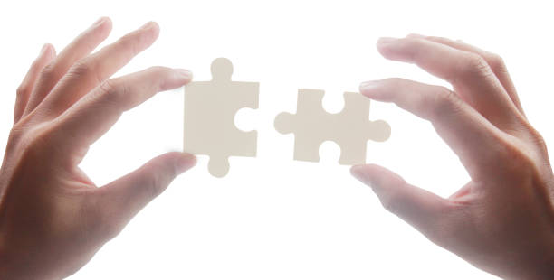istock Connecting jigsaw puzzle. Business solutions success 1486958819