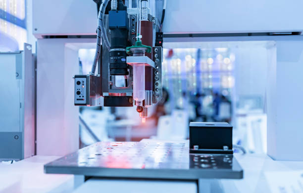 istock Robot holding glue syringe Injection with robotic machine vision system 1486961045
