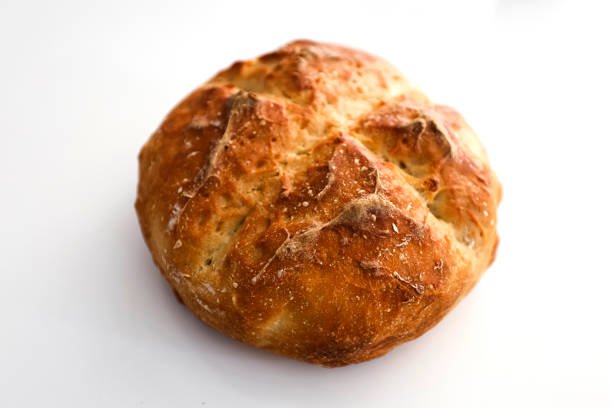 White bread using a no knead dough recipe. Water, all purpose flour, yeast, and salt.