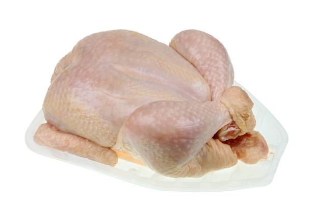 istock Fresh broiler chicken in a plastic factory container isolated 1486971555