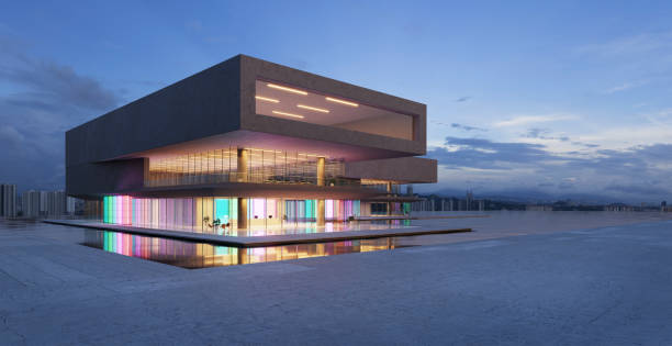 istock 3D modern buildings have colored gradient glass walls with a pond landscaping in front 1486983274