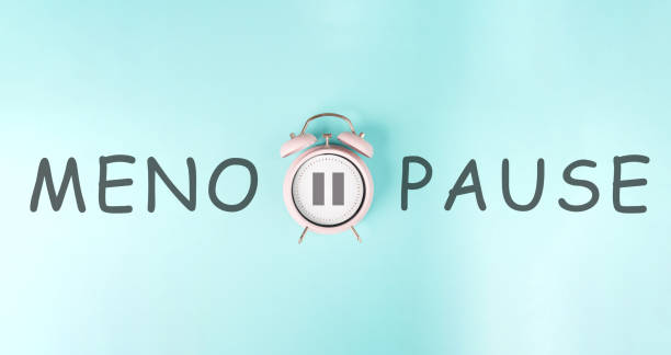 istock Alarm clock with pause sign, menopause concept, hormone replacement therapy 1486984268