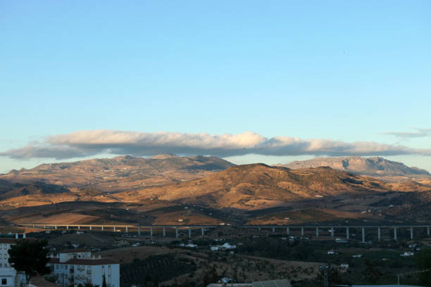 istock Sun and rain clouds over Guadalhorce valley. 1486984539