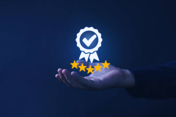 istock Businessman holding and showing best quality guarantee blue light 1486990041