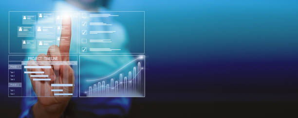 istock Business data management system concept background. Business person working on computer updating tasks and milestones progress, complete the online survey form. Banner. Copy space. 1486990090