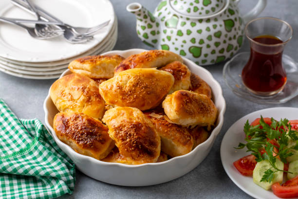 istock Turkish cuisine; Handmade Cheese Pastry (Turkish name; peynirli pogaca) 1486991444